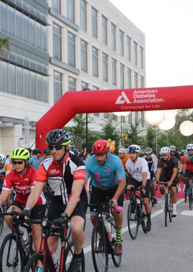 Large group of cyclists beginning ADA tour de cure bike ride