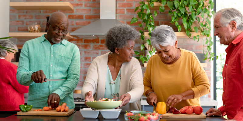 group of happy diverse senior male and female friends