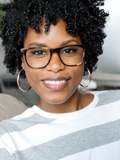 Smiling African American woman with glasses