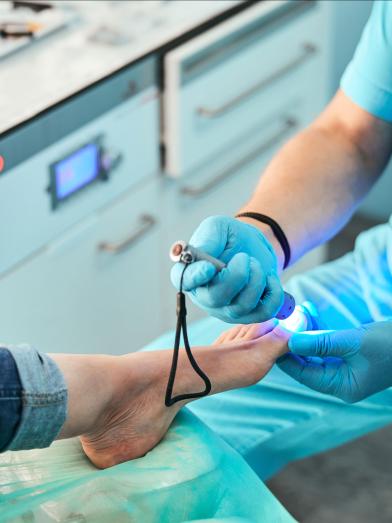 Doctor examining patient's foot